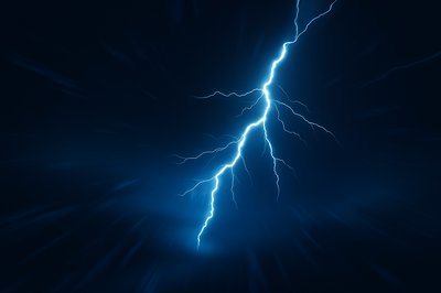 Dynamic Flash of Lightning Against Dark Background