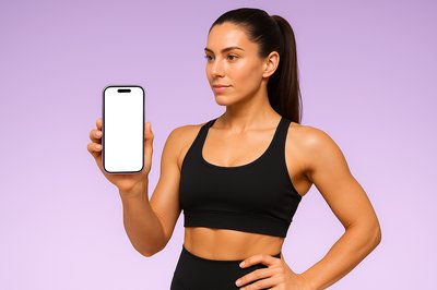 Fitness Trainer Holding a Phone Against a Purple Background