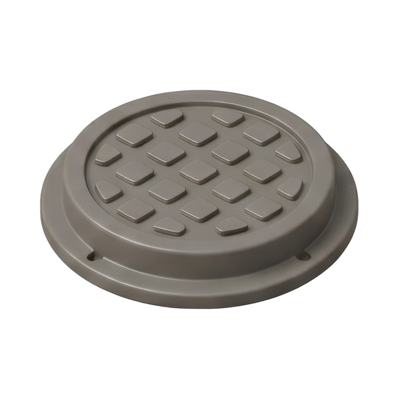 round manhole cover on pavement