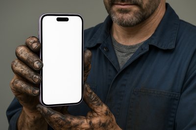 Mechanic Holding a Purple Phone with Oily Hands
